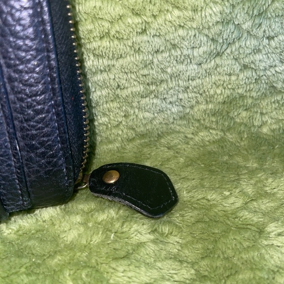 Dooney and Bourke zip along wallet in solid black. - Picture 7 of 12
